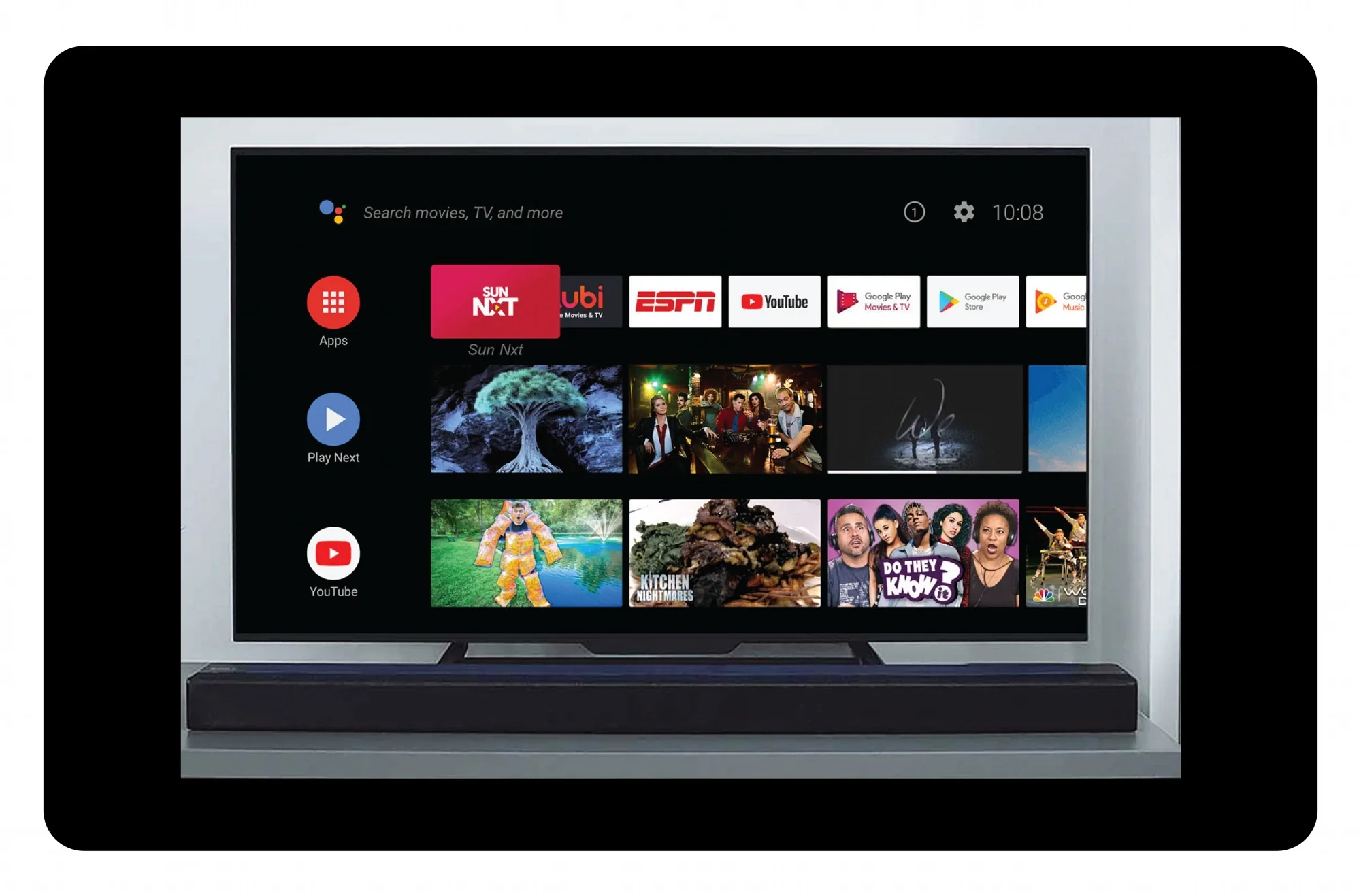 A living-room television home screen with the Sun NXT tile sitting beside Tubi, ESPN and YouTube